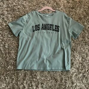 teal shirt